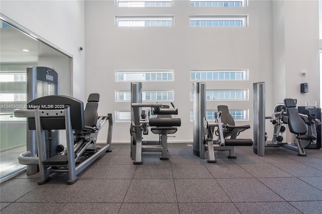 1040 Biscayne Blvd Unit 3802, Miami, FL 33132 - exercise room featuring a towering ceiling and healthy amount of natural light