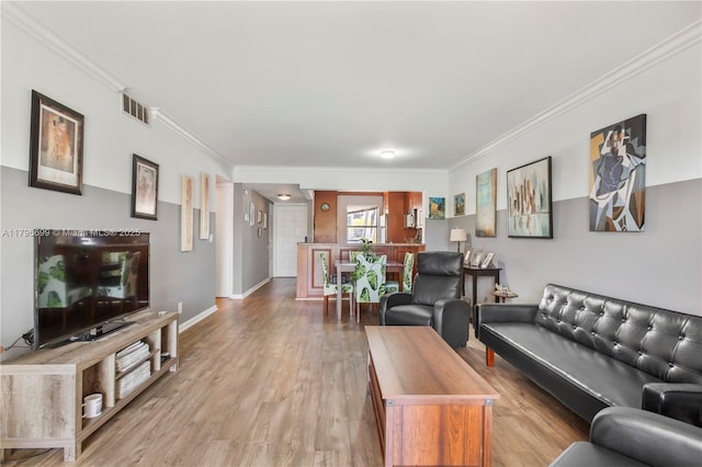 22053 Palms Way Unit 106, Boca Raton, FL 33433 - living area featuring crown molding, light wood-style flooring, and baseboards