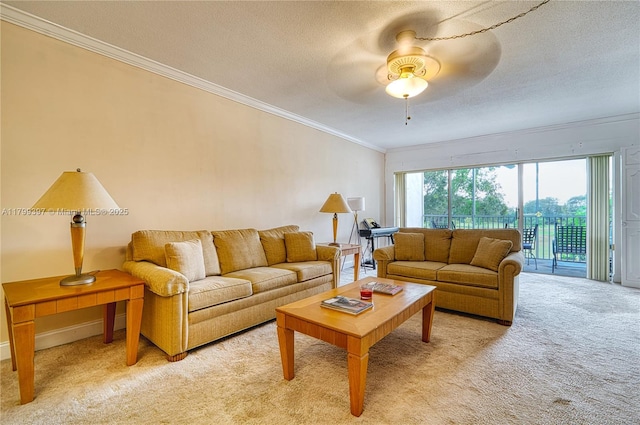 living room with crown molding, light colored carpet, ceiling fan, and a textured ceiling