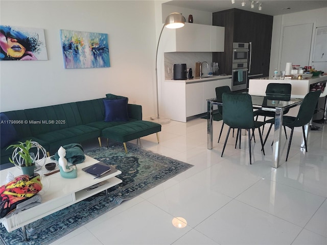 living area with light tile patterned floors