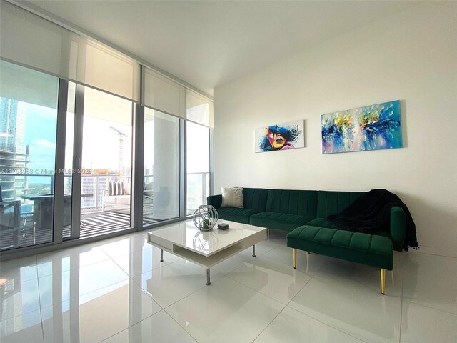 851 NE 1st Ave Unit 1700, Miami, FL 33132 - living room with floor to ceiling windows and tile patterned flooring