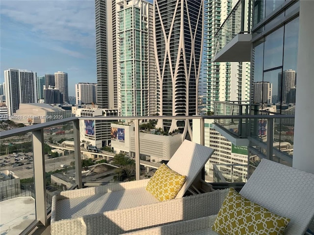 balcony featuring a city view