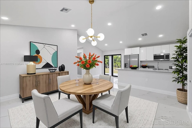 dining room with light marble finish floors, recessed lighting, a chandelier, baseboards, and lofted ceiling