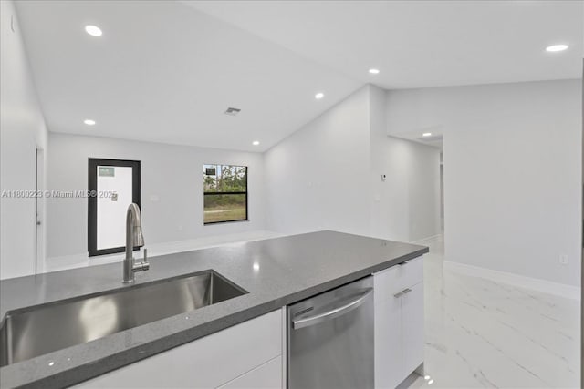 kitchen featuring dishwasher, a sink, light marble finish flooring, modern cabinets, and recessed lighting