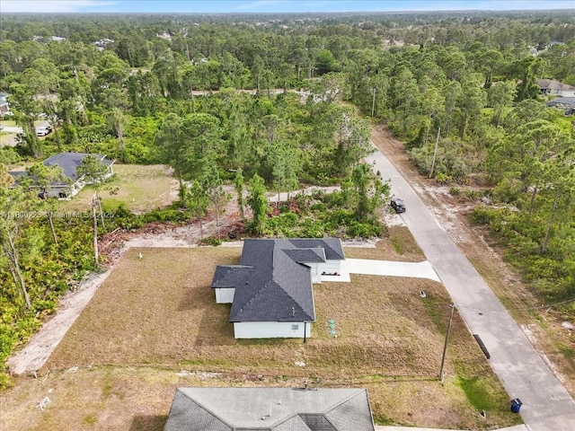 drone / aerial view of a heavily wooded area