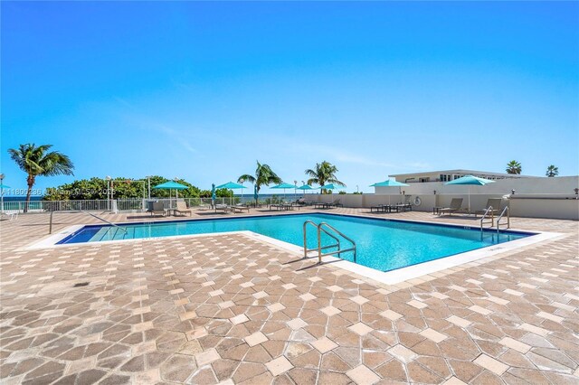 5701 Collins Ave Unit 917, Miami Beach, FL 33140 - community pool featuring fence and a patio