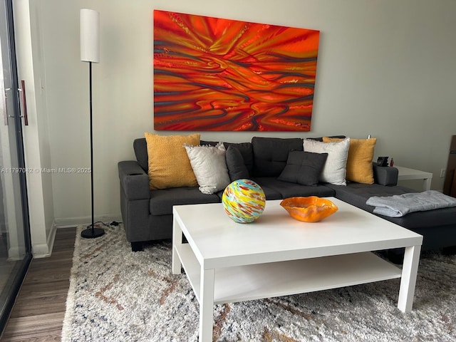 2851 Somerset Dr Unit 307, Lauderdale Lakes, FL 33311 - living area with wood finished floors