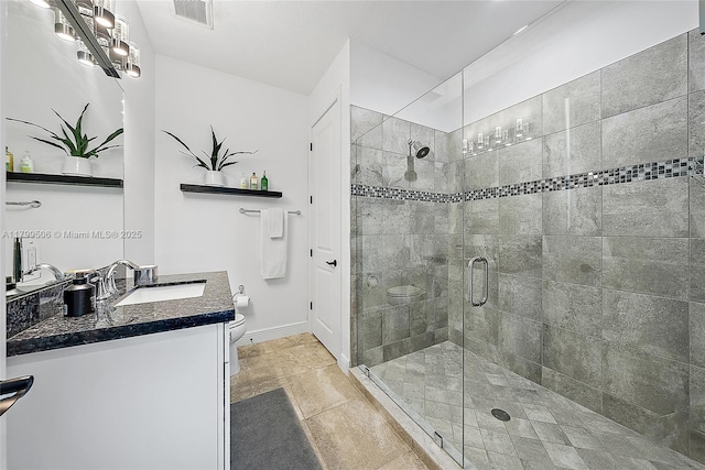 2069 Dickens Ter, Palm Beach Gardens, FL 33418 - bathroom featuring toilet, a stall shower, vanity, and baseboards