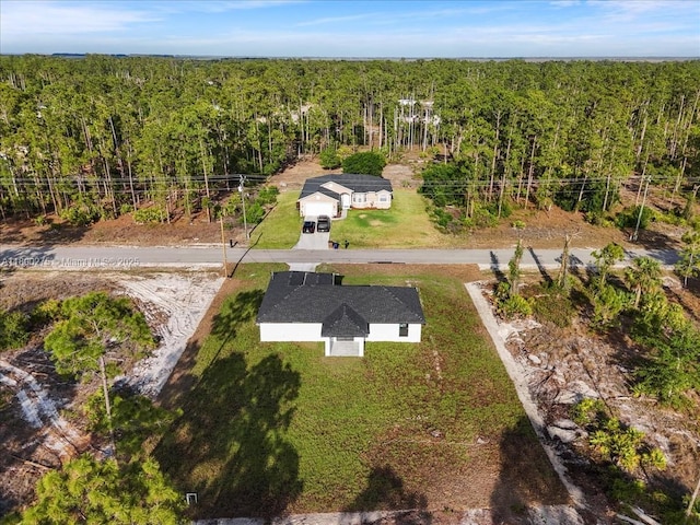 817 Moore Ave, Lehigh Acres, FL 33972 - view from above of property featuring a forest
