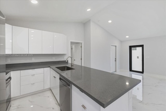 817 Moore Ave, Lehigh Acres, FL 33972 - kitchen with vaulted ceiling, a sink, light marble finish flooring, stainless steel dishwasher, and modern cabinets