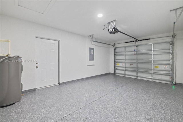 817 Moore Ave, Lehigh Acres, FL 33972 - garage featuring water heater and a garage door opener