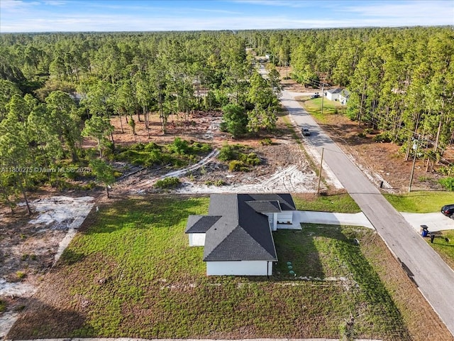 817 Moore Ave, Lehigh Acres, FL 33972 - drone / aerial view of a heavily wooded area