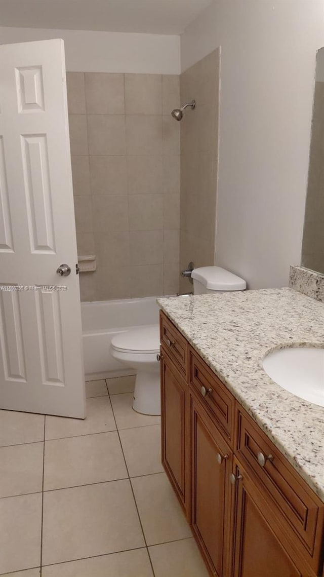 2520 Van Buren St Unit 7, Hollywood, FL 33020 - full bathroom with tile patterned flooring, vanity, toilet, and  shower combination