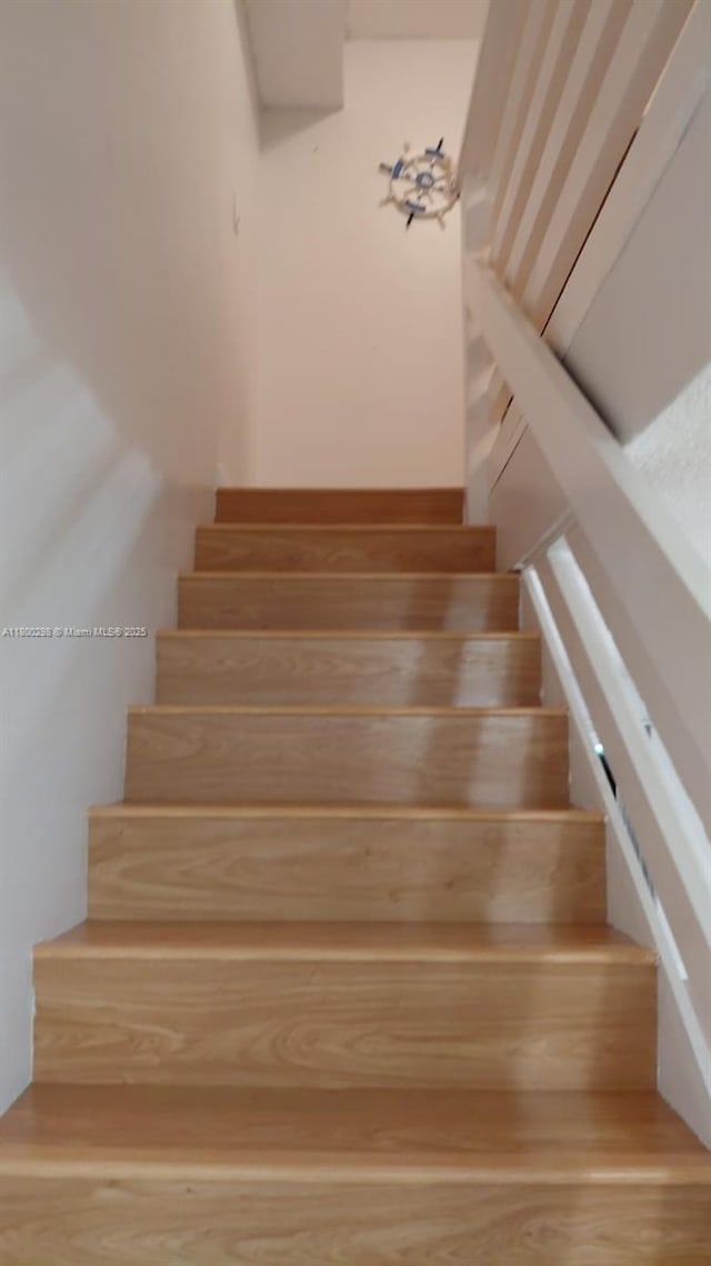 2520 Van Buren St Unit 7, Hollywood, FL 33020 - stairway featuring wood finished floors