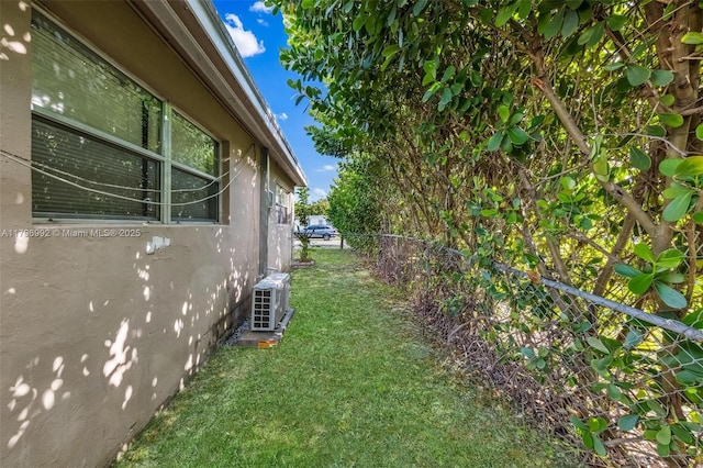 5720 SW 40th Ct, West Park, FL 33023 - view of side of property featuring a cooling unit and stucco siding