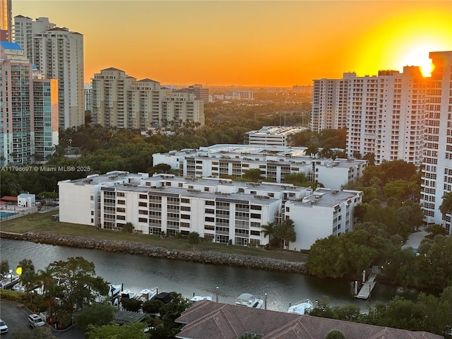 view of urban area featuring a nearby body of water