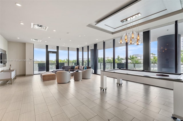 5300 NW 85th Ave Unit 1104, Doral, FL 33166 - lobby with a wall of windows and recessed lighting
