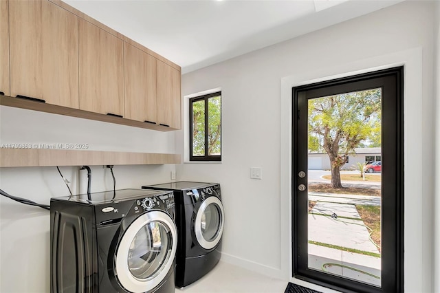 9494 SW 144th St, Miami, FL 33176 - laundry area featuring cabinet space, separate washer and dryer, and baseboards