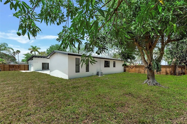 9494 SW 144th St, Miami, FL 33176 - back of property with stucco siding and cooling unit