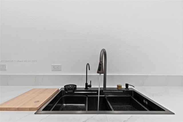 6900 Bay Dr Unit 10I, Miami Beach, FL 33141 - kitchen view of a sink and light stone countertops