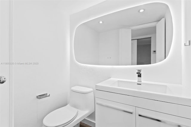6900 Bay Dr Unit 10I, Miami Beach, FL 33141 - bathroom with toilet, recessed lighting, and vanity