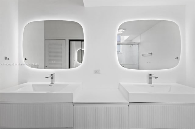 6900 Bay Dr Unit 10I, Miami Beach, FL 33141 - full bath featuring double vanity and a shower with shower door