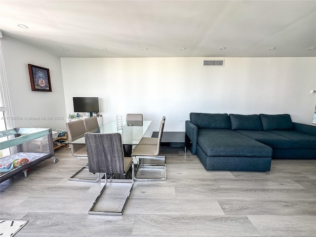 3731 N Country Club Dr Unit 2228, Aventura, FL 33180 - living room featuring wood finished floors and recessed lighting