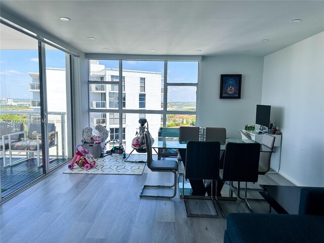 3731 N Country Club Dr Unit 2228, Aventura, FL 33180 - dining room featuring wood finished floors and expansive windows