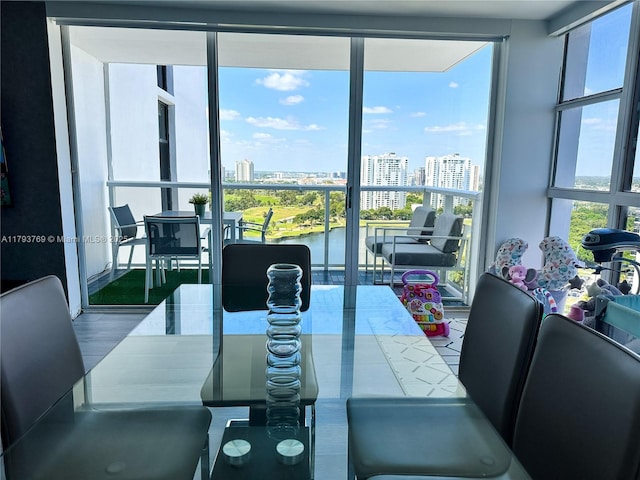 3731 N Country Club Dr Unit 2228, Aventura, FL 33180 - dining area featuring a city view and wood finished floors