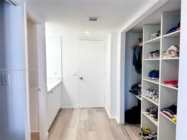 3731 N Country Club Dr Unit 2228, Aventura, FL 33180 - mudroom featuring light wood-style flooring and baseboards