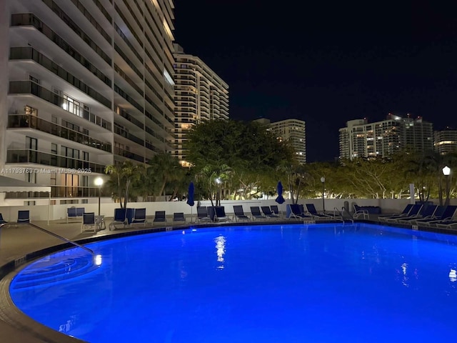 3731 N Country Club Dr Unit 2228, Aventura, FL 33180 - pool at night featuring a community pool