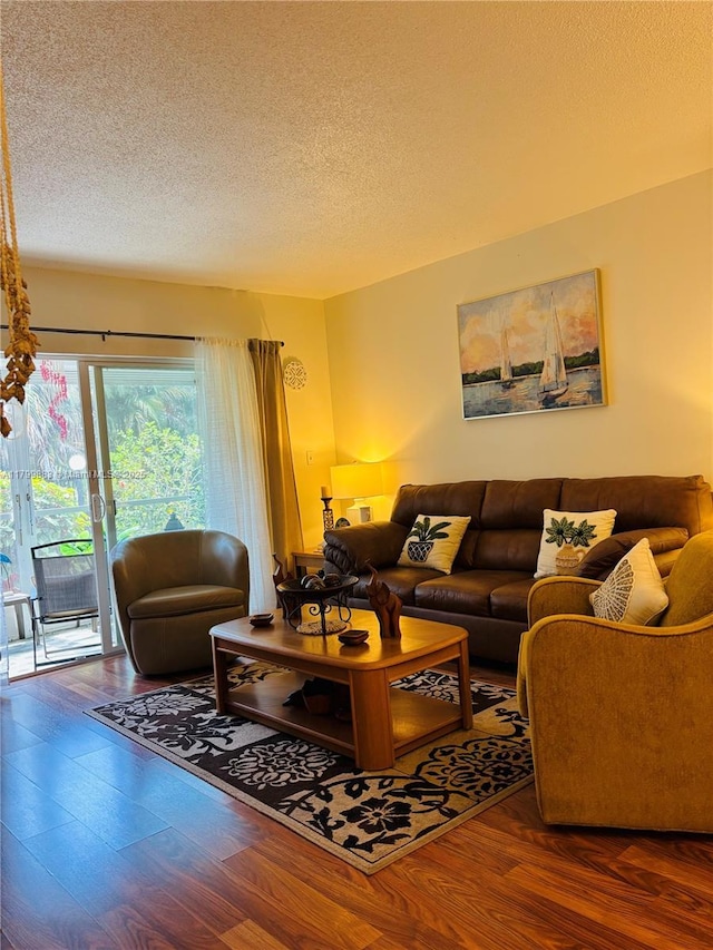 940 Hillcrest Ct Unit 112, Hollywood, FL 33021 - living area with wood finished floors and a textured ceiling
