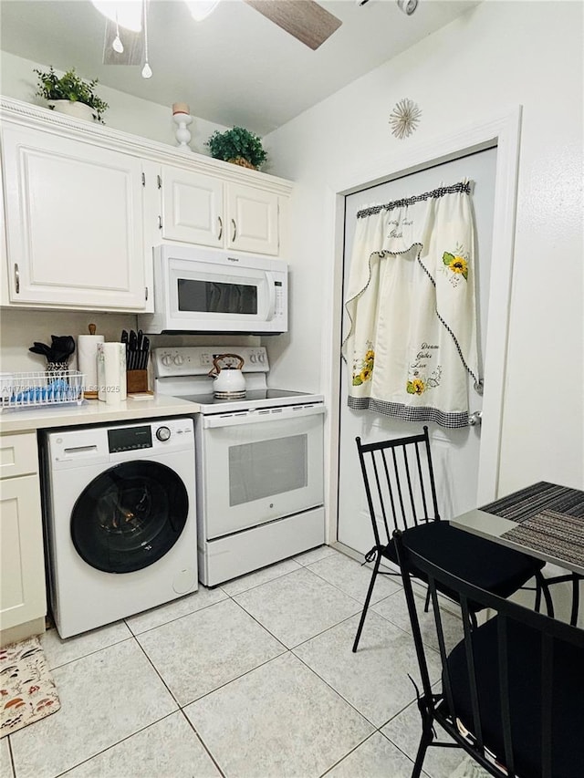 940 Hillcrest Ct Unit 112, Hollywood, FL 33021 - clothes washing area with washer / dryer and light tile patterned floors