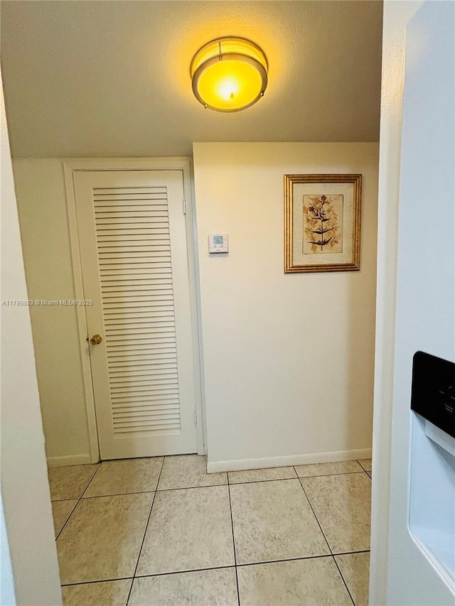 940 Hillcrest Ct Unit 112, Hollywood, FL 33021 - hall featuring light tile patterned flooring
