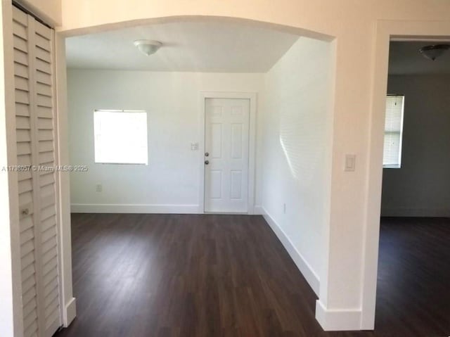 1291 NE 146th St, Miami, FL 33161 - spare room with dark wood-type flooring and baseboards