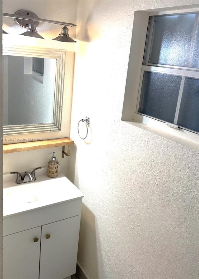 1291 NE 146th St, Miami, FL 33161 - bathroom with a textured wall and vanity