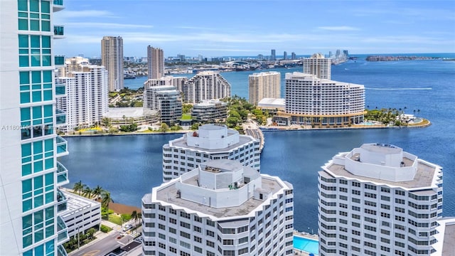view of urban area featuring a nearby body of water
