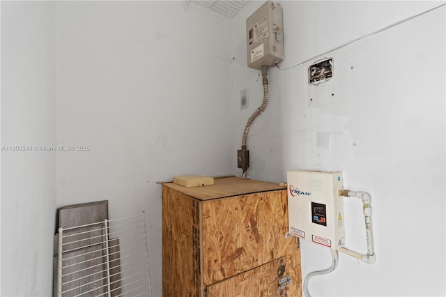 300 SW 134th Way Unit 413E, Pembroke Pines, FL 33027 - utility room featuring water heater