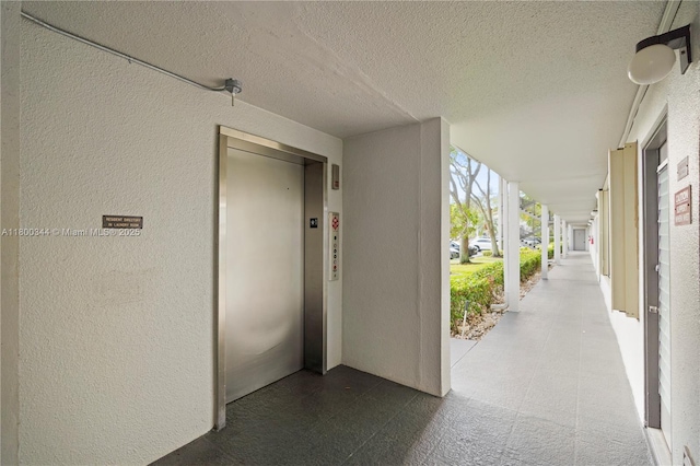 300 SW 134th Way Unit 413E, Pembroke Pines, FL 33027 - corridor featuring elevator