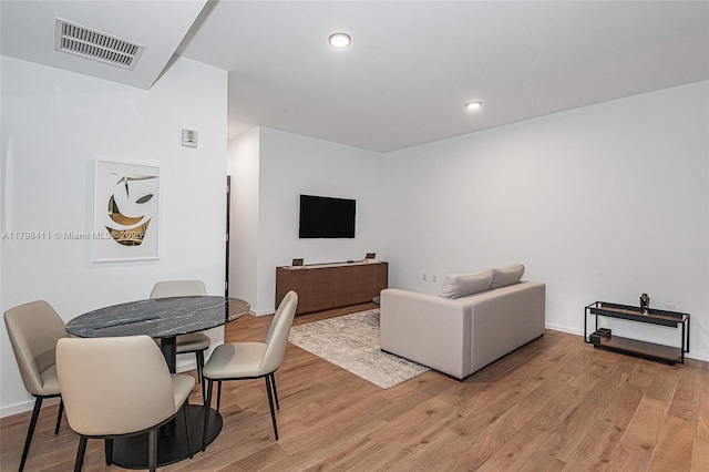 398 NE 5th St Unit 2415, Miami, FL 33132 - living room with light wood-type flooring, baseboards, and recessed lighting