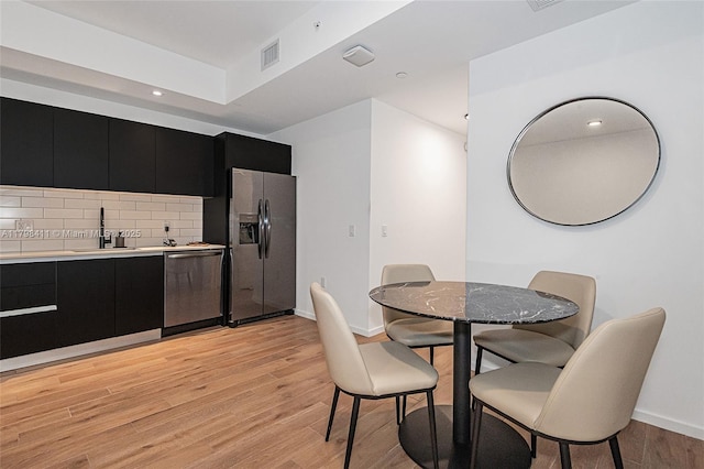 398 NE 5th St Unit 2415, Miami, FL 33132 - dining space featuring baseboards, light wood-style flooring, and recessed lighting