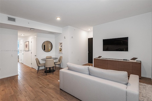 398 NE 5th St Unit 2415, Miami, FL 33132 - living area featuring light wood-style flooring, baseboards, and recessed lighting