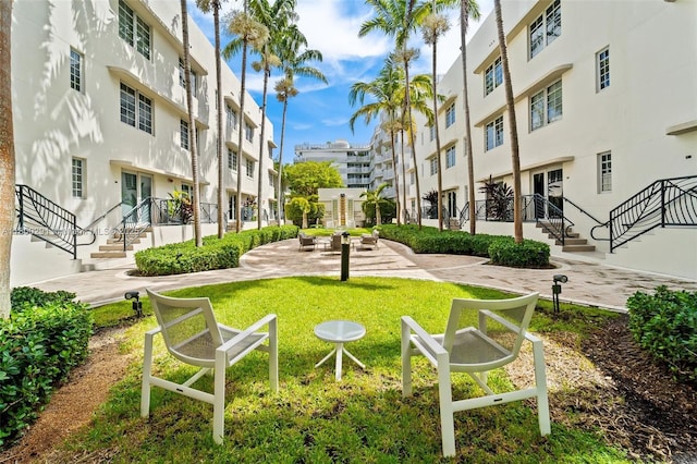 435 21st St Unit 212, Miami Beach, FL 33139 - surrounding community with stairway and a yard