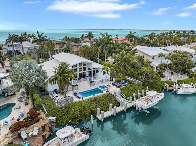 1220 Coury Dr, Key Colony, FL 33051 - aerial view of a pool and a large body of water