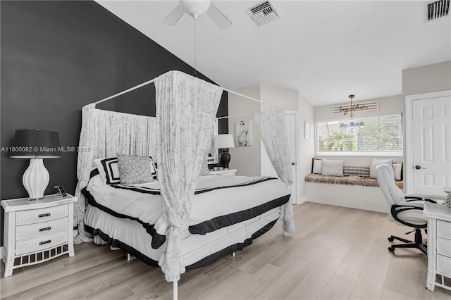1220 Coury Dr, Key Colony, FL 33051 - bedroom featuring wood finished floors, a chandelier, a ceiling fan, lofted ceiling, and an office area