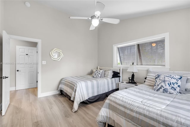 1220 Coury Dr, Key Colony, FL 33051 - bedroom with light wood-style flooring, baseboards, and a ceiling fan