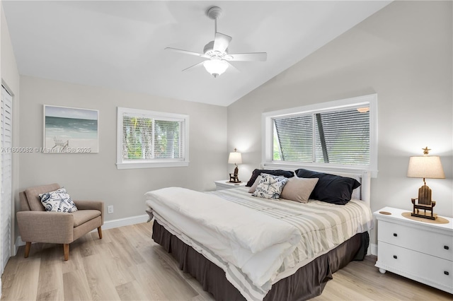 1220 Coury Dr, Key Colony, FL 33051 - bedroom featuring light wood-type flooring, lofted ceiling, baseboards, and a ceiling fan
