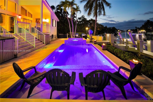 1220 Coury Dr, Key Colony, FL 33051 - view of pool featuring a pool with connected hot tub, a patio area, and stairway