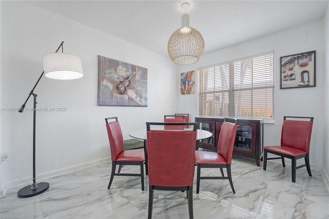 11324 NW 74th Ter, Doral, FL 33178 - dining area with light marble finish flooring and baseboards