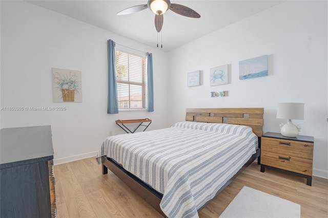 11324 NW 74th Ter, Doral, FL 33178 - bedroom featuring light wood-style flooring, baseboards, and a ceiling fan